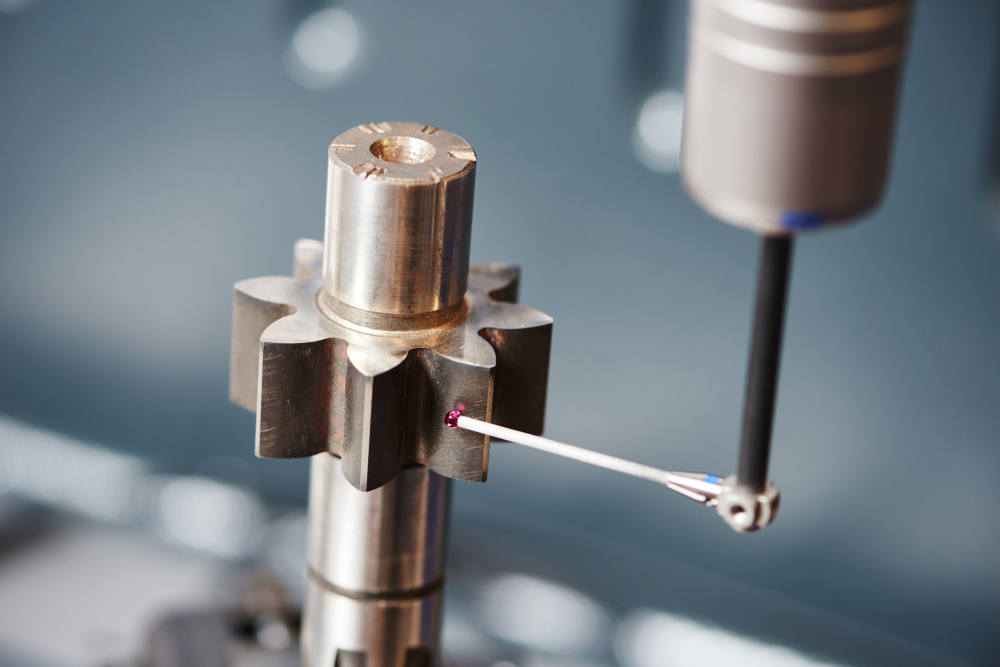 coordinate measuring probe evaluating a cog wheel