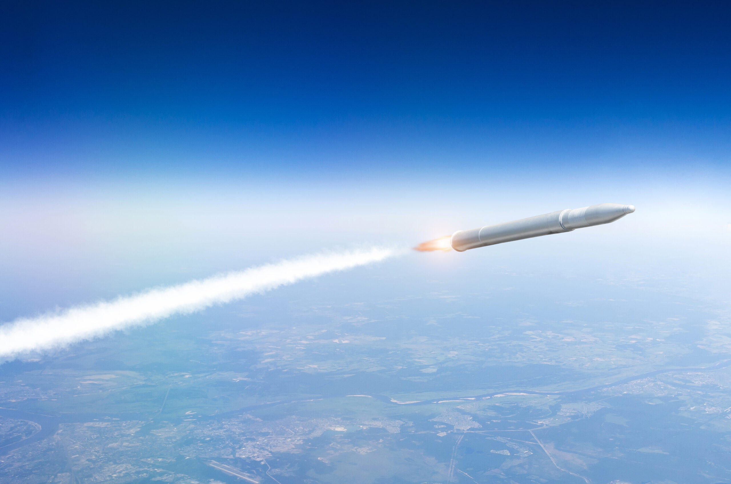 A missile in flight in the upper atmosphere.